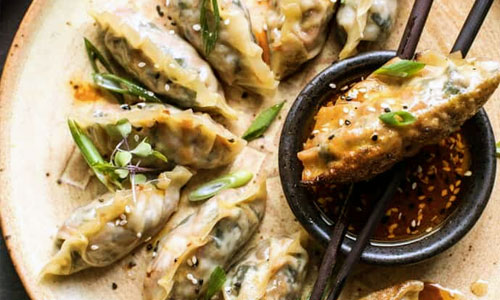 Pan-fried Vegetable Potstickers on a plate